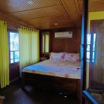 Riverine Hut – A charming eco-friendly hut nestled by the backwaters, providing a rustic yet comfortable stay close to nature at Riverine Homestay.